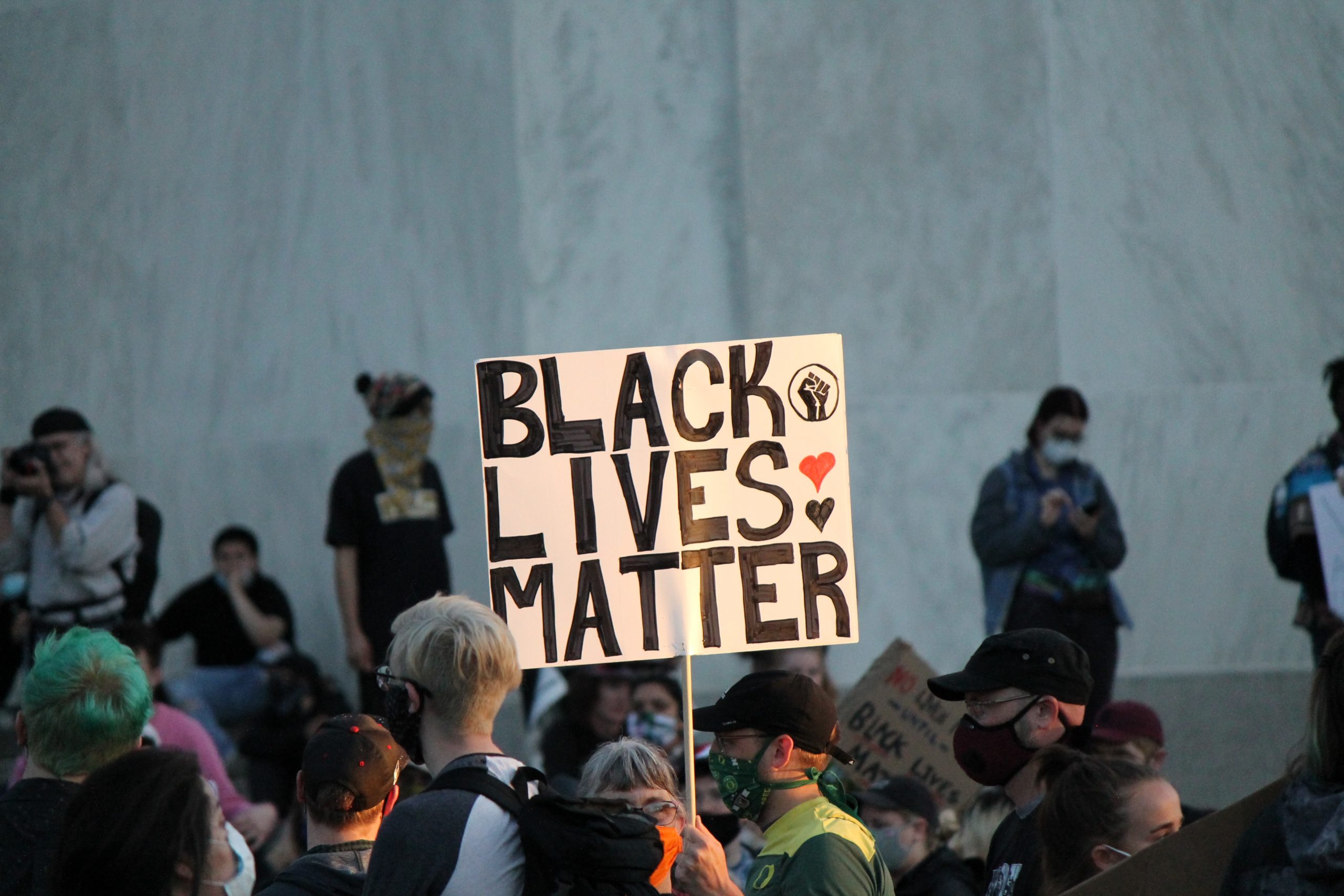 Photos: Monday’s Peaceful Vigil Contrasts Two Days Of Protests Ending In Violence