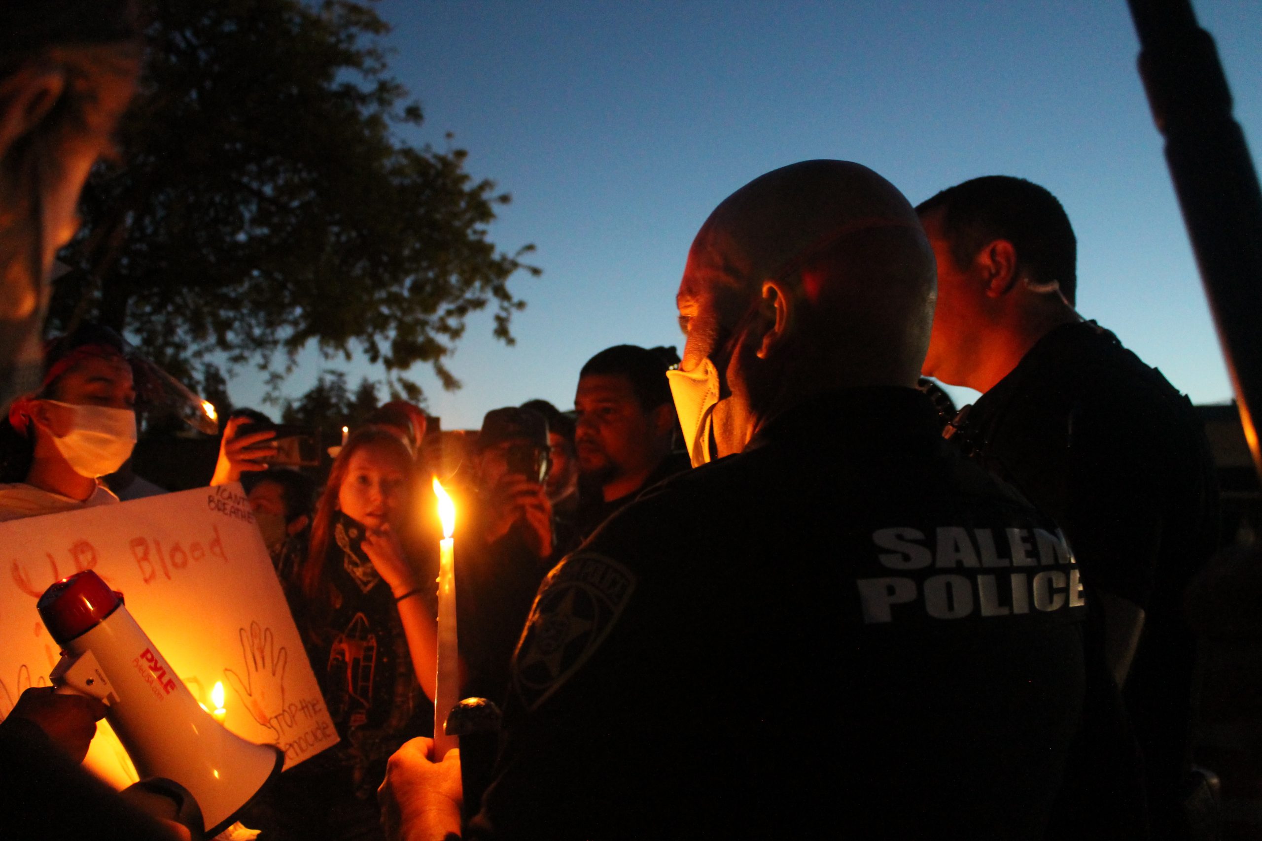 Police Join Protestors Honoring George Floyd During Monday’s Vigil