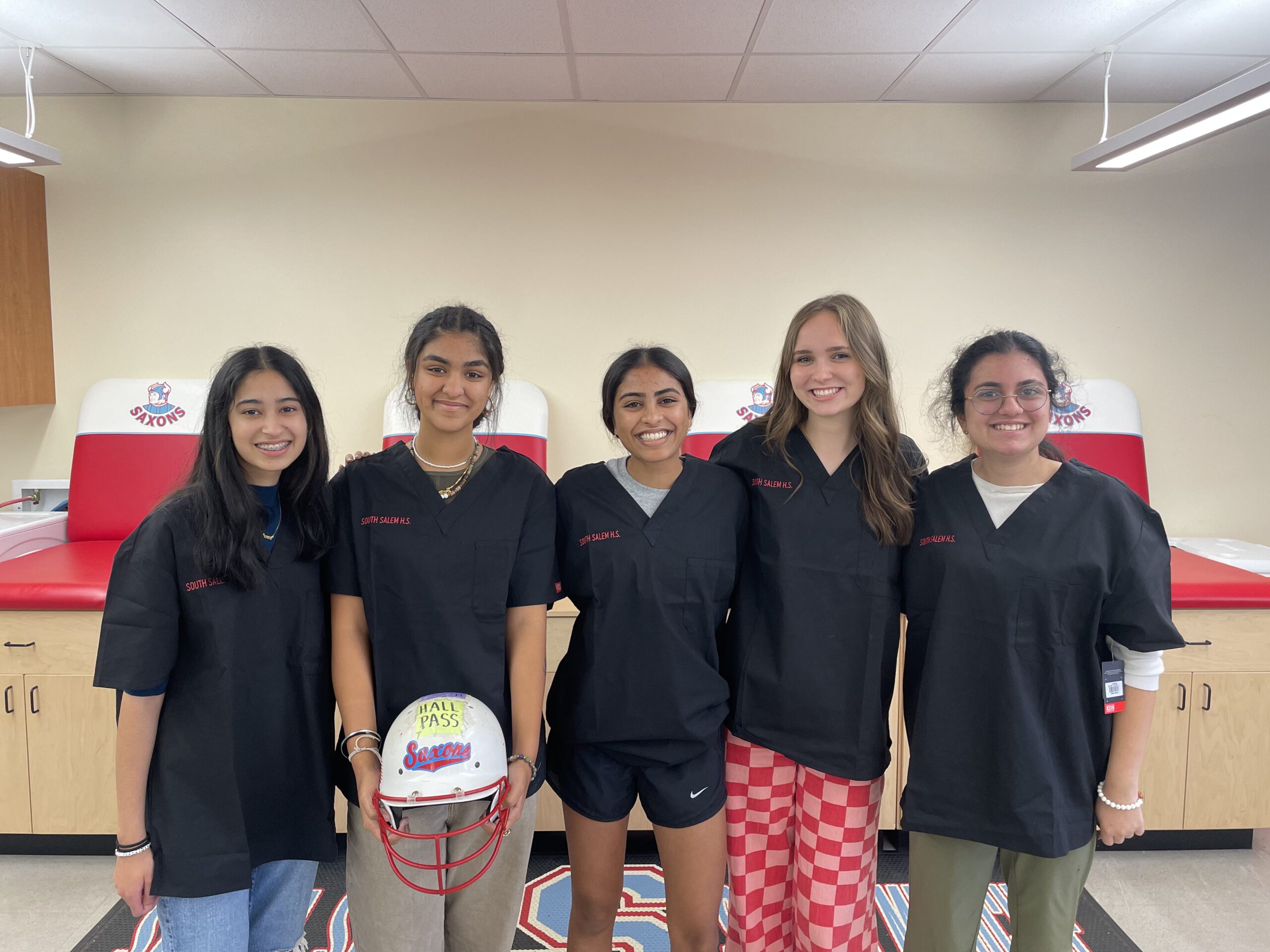 South Salem High School's HOSA Club leadership team stands in line together.