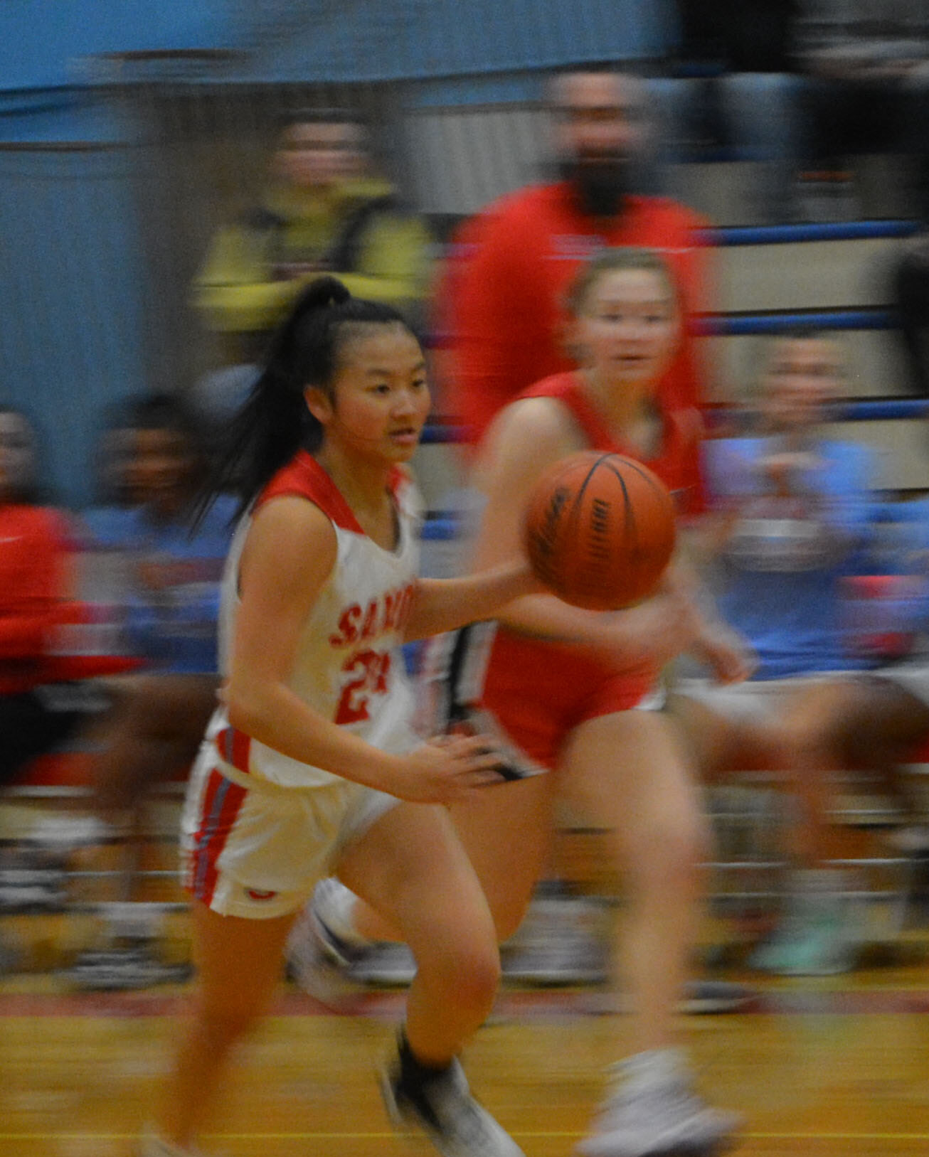 South Salem's Sadie Patterson runs up-court while holding control of the ball.