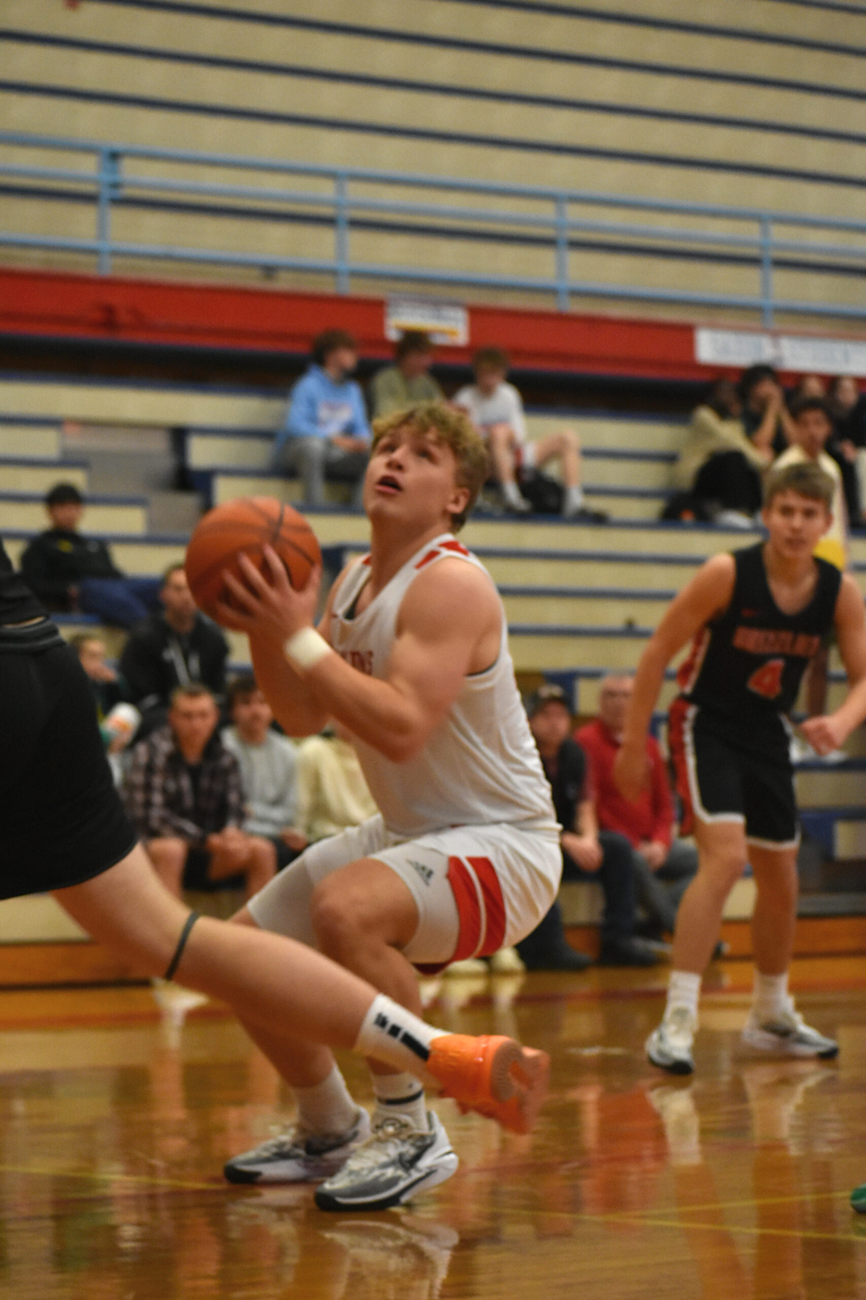 Image of South Salem High School's Teagan Scott, '26, looking to score under the basket.