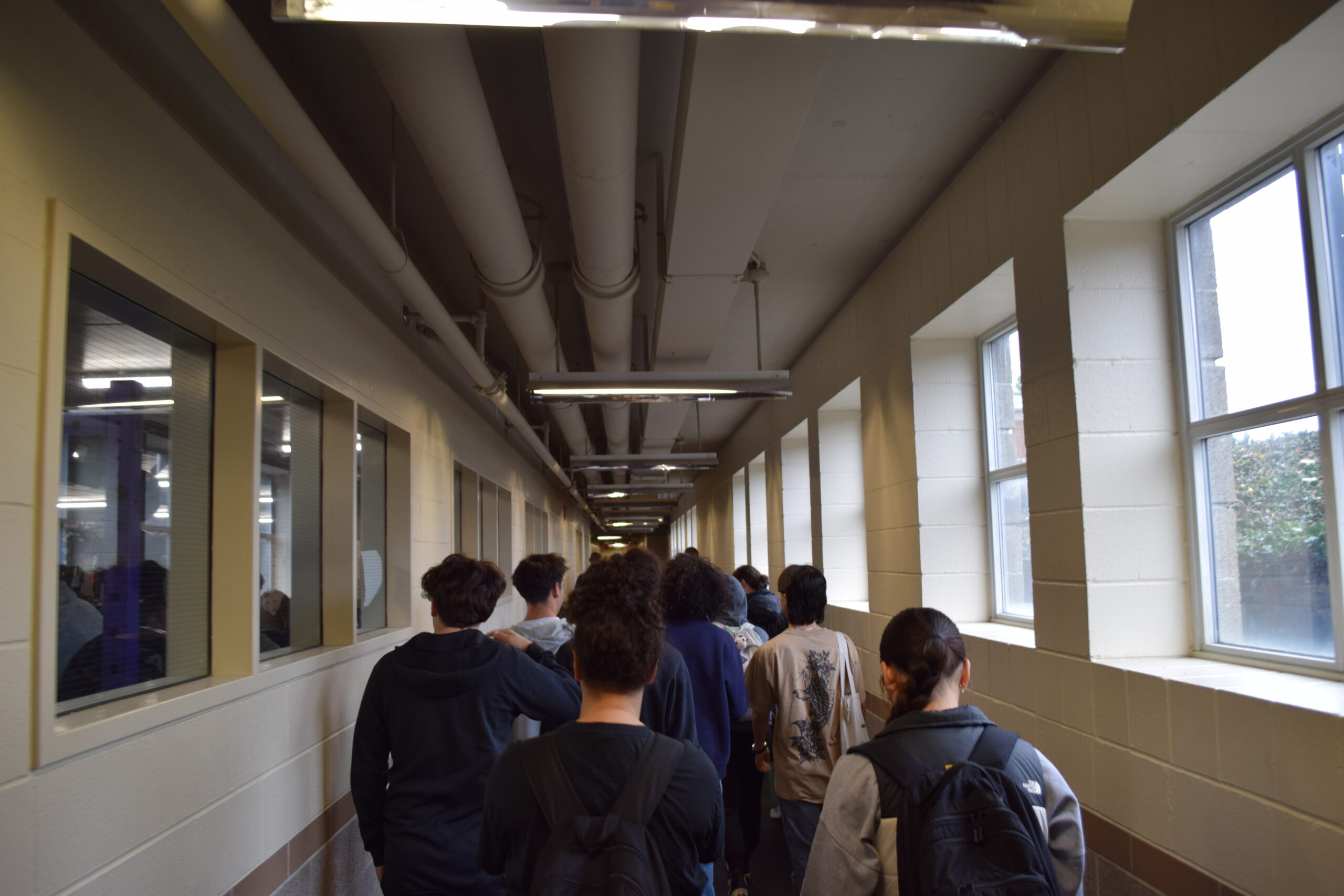 Student walk down the CTEC hallways.