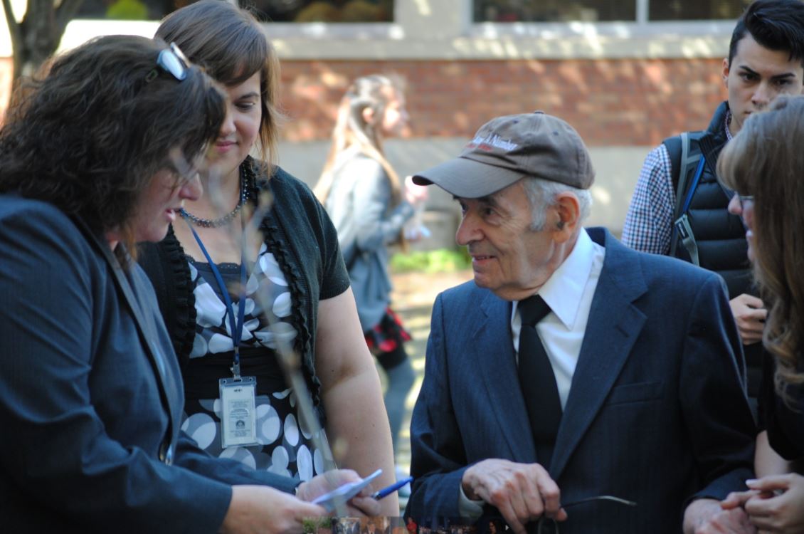 Alter Wiener speaking to former South Salem principal Lara Tiffin and current South Salem teacher JoyAnna Forsyhte. Photo courtesy of Lyn Mellon.