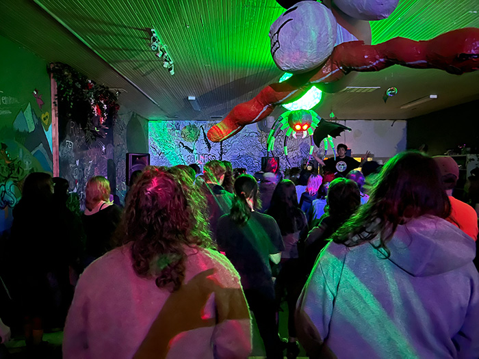 Radness Ensues, local music venue in Keizer, OR, during a set performed by Squids. Photo via Radness Ensues Venue Owner, Becka Brisbin.