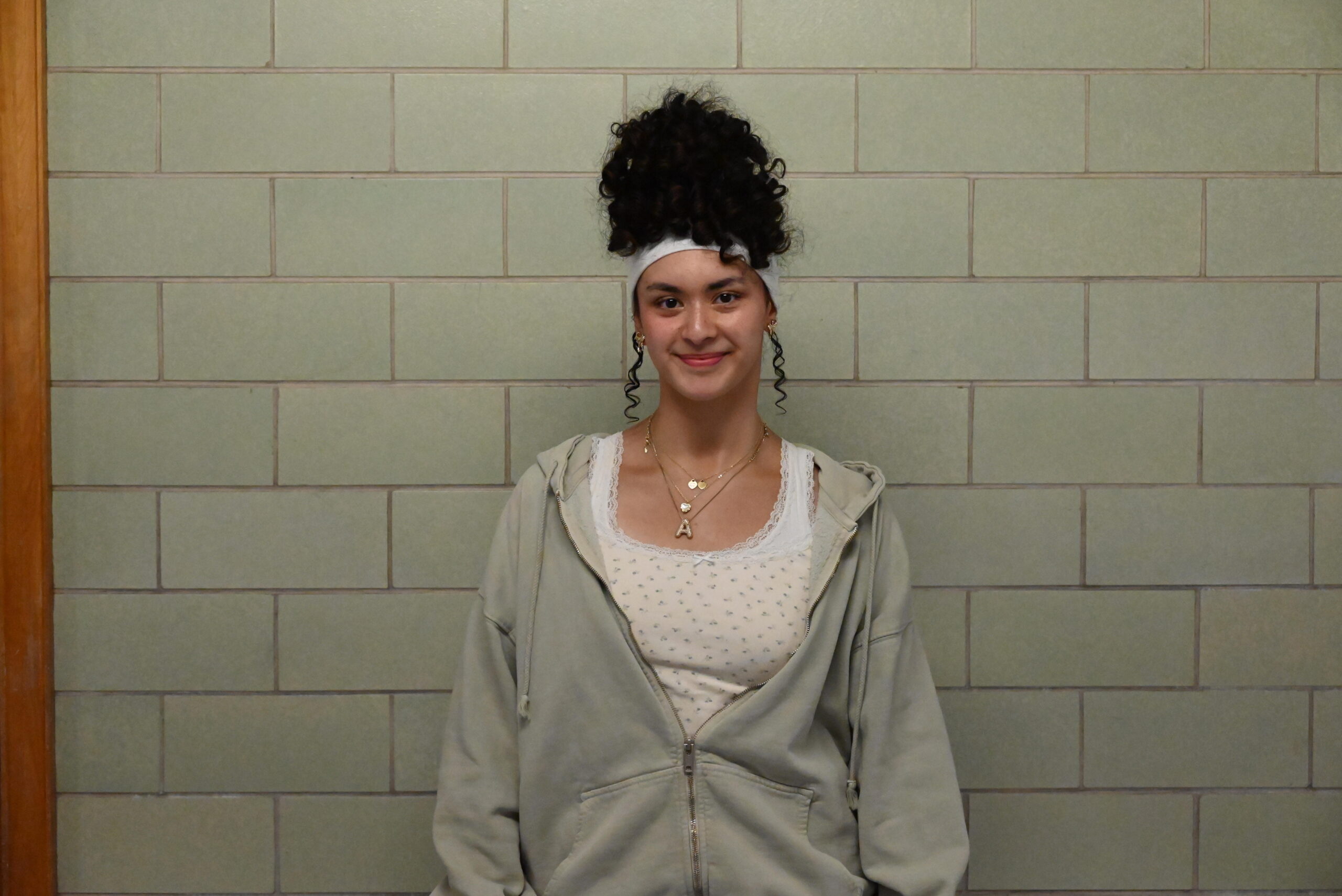 Hannah Al-Alanyan standing in South Salem High School Halls